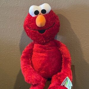 Fisher-Price 2002 Vintage Elmo with original tags.